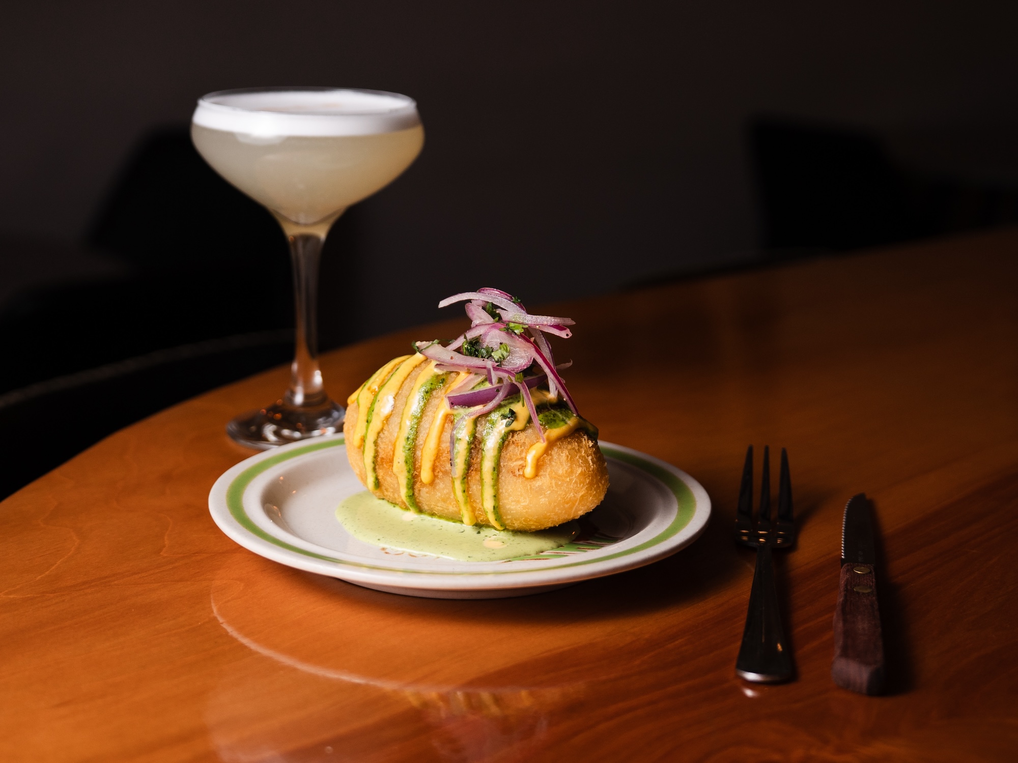 Eat this Peruvian dish at Brasas in the Delmar Loop